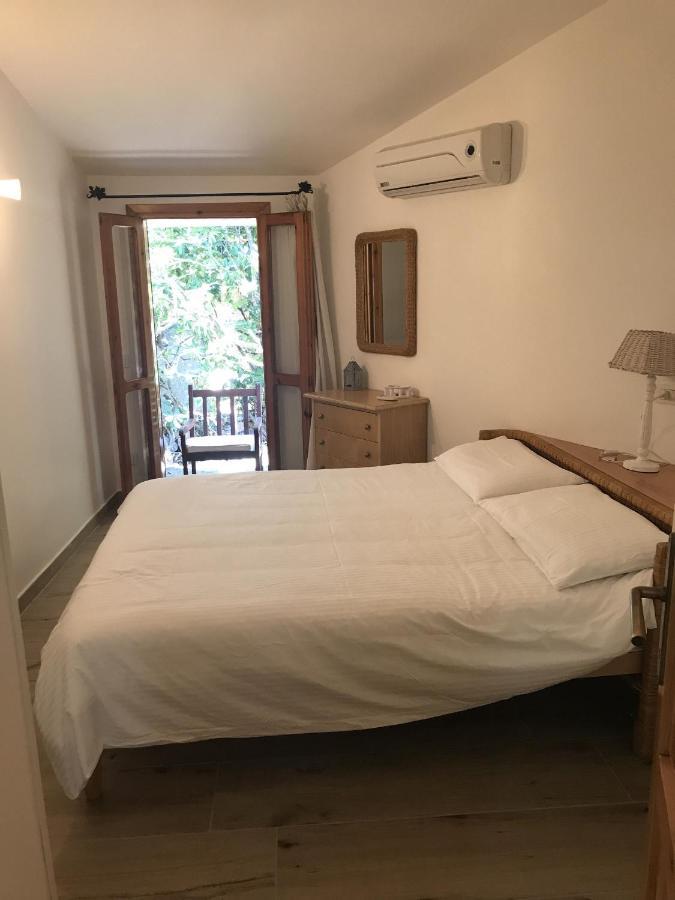 Porto Istana Beach House 奧爾比亞 外观 照片